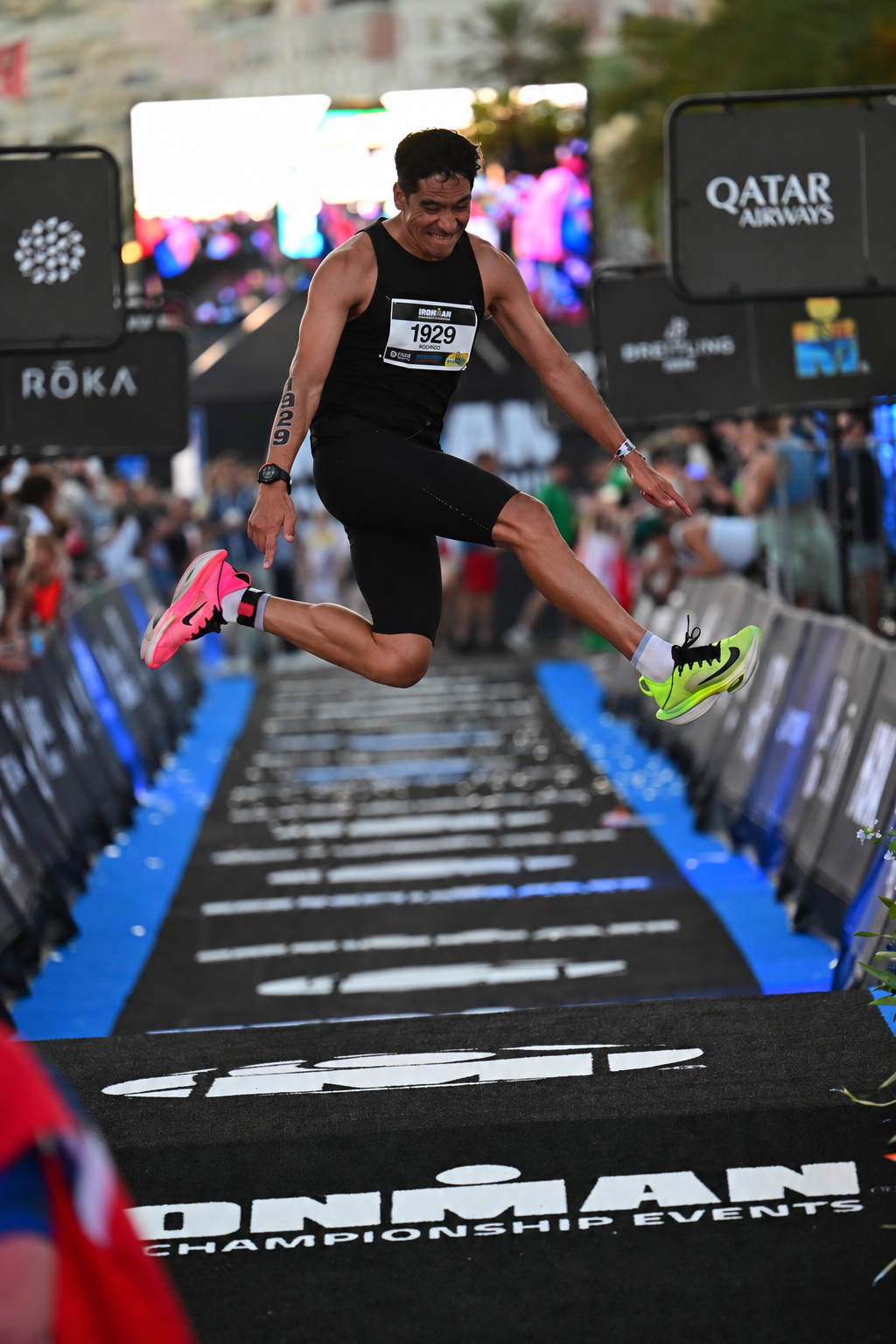 Rodrigo jumping in the air as he crosses the World Championship finish line.